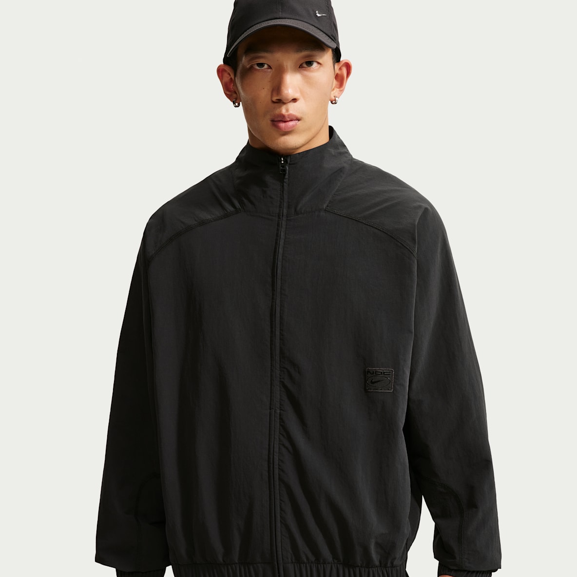 Nike เสื้อแจ็คเก็ตแบบทอซิปยาวขนาดโอเวอร์ไซส์ผู้ชาย Dri-FIT N.A.C.