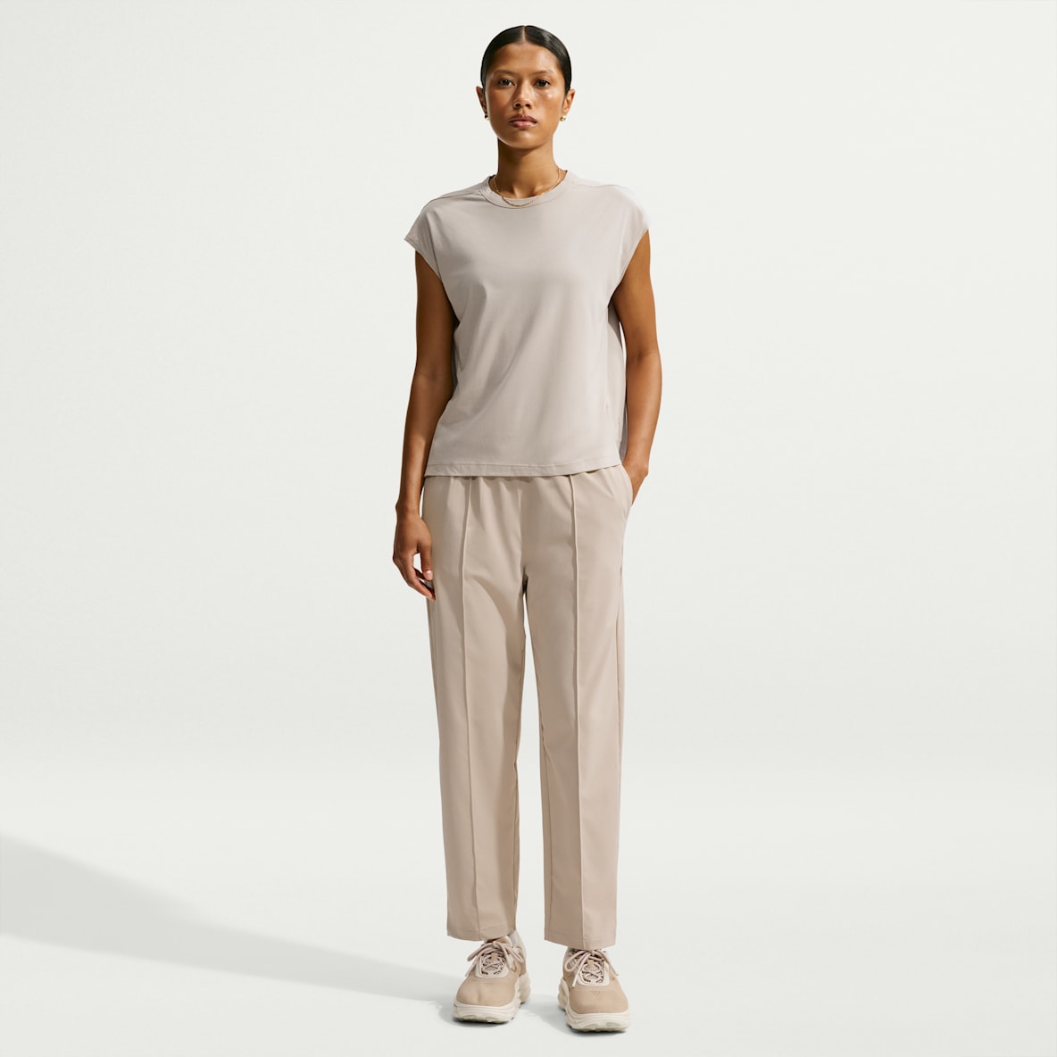 Nike 24.7 PerfectStretch Women's Dri-FIT UV Protection High-Rise Tapered Pants