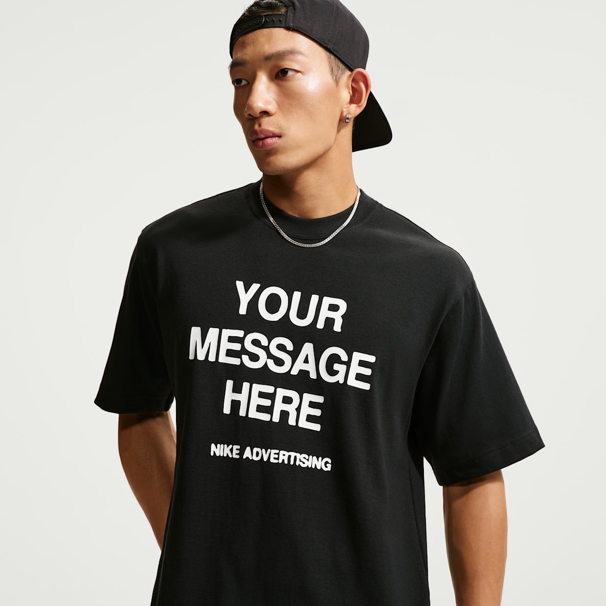 나이키 '유어 메시지 히어' 티셔츠