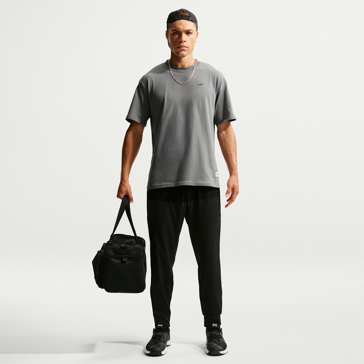 Nike Primary NanoKnit Dri-FIT teknisk joggebukse til herre med UV-beskyttelse