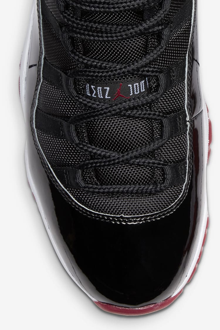 Jordan 11 red and black release date best sale