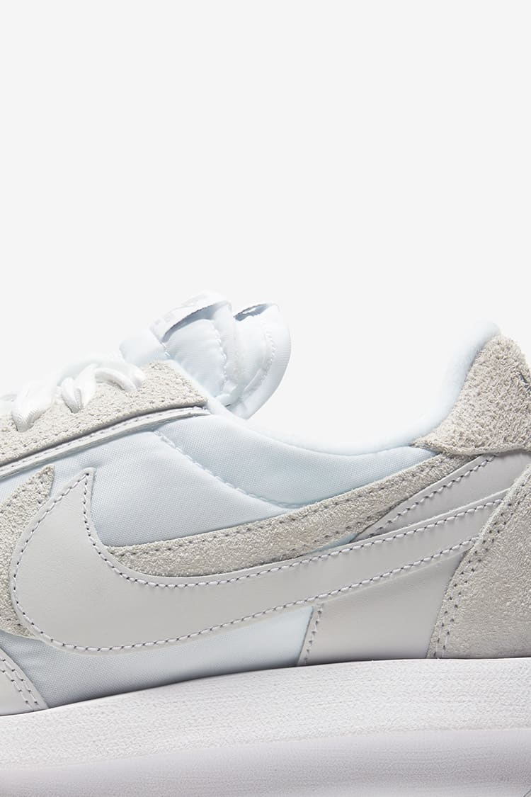 Nike sacai white grey release date best sale