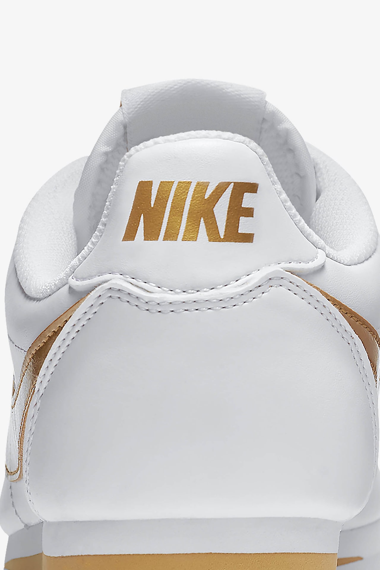 Gold and white nike cortez hotsell