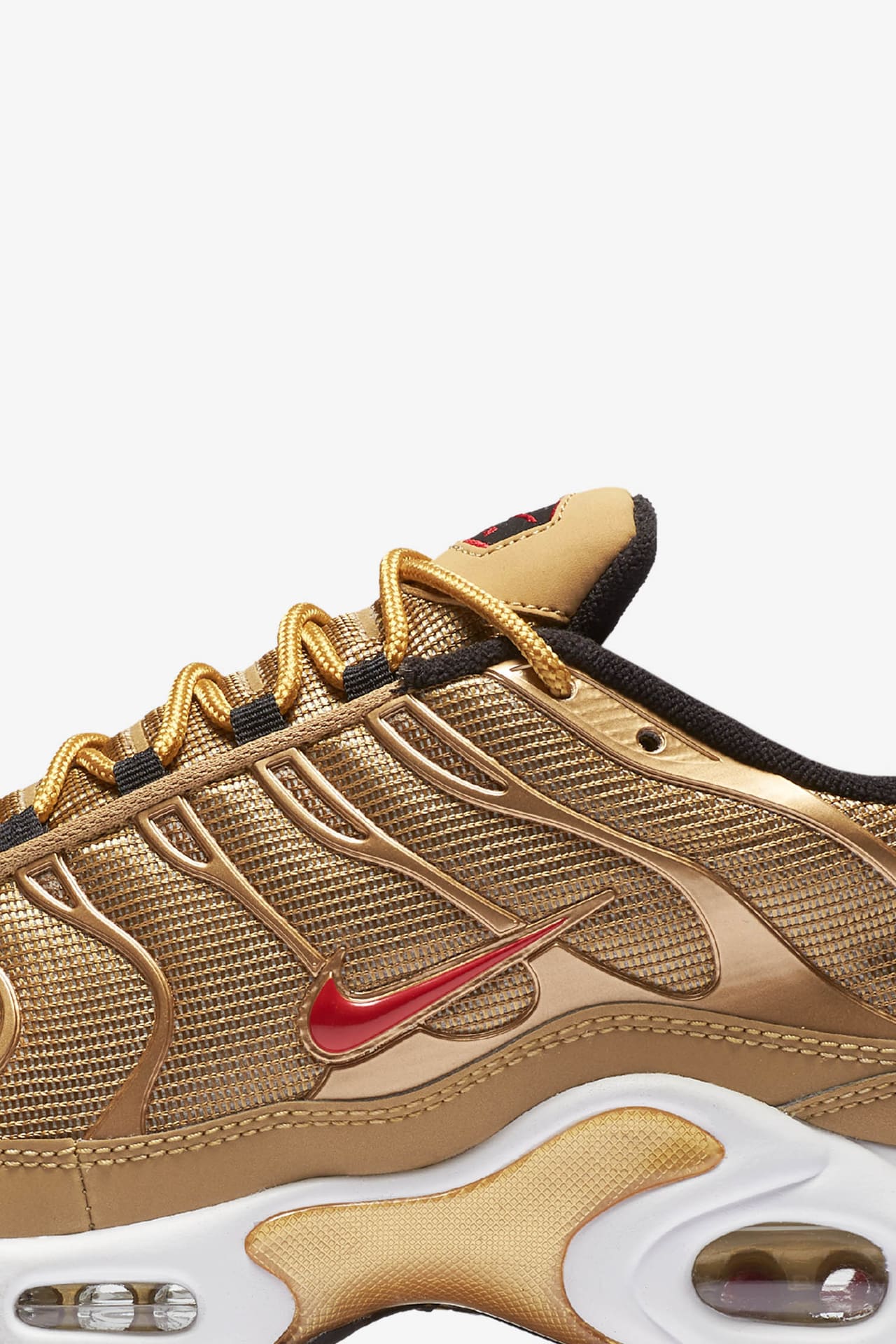 Nike metallic gold hotsell