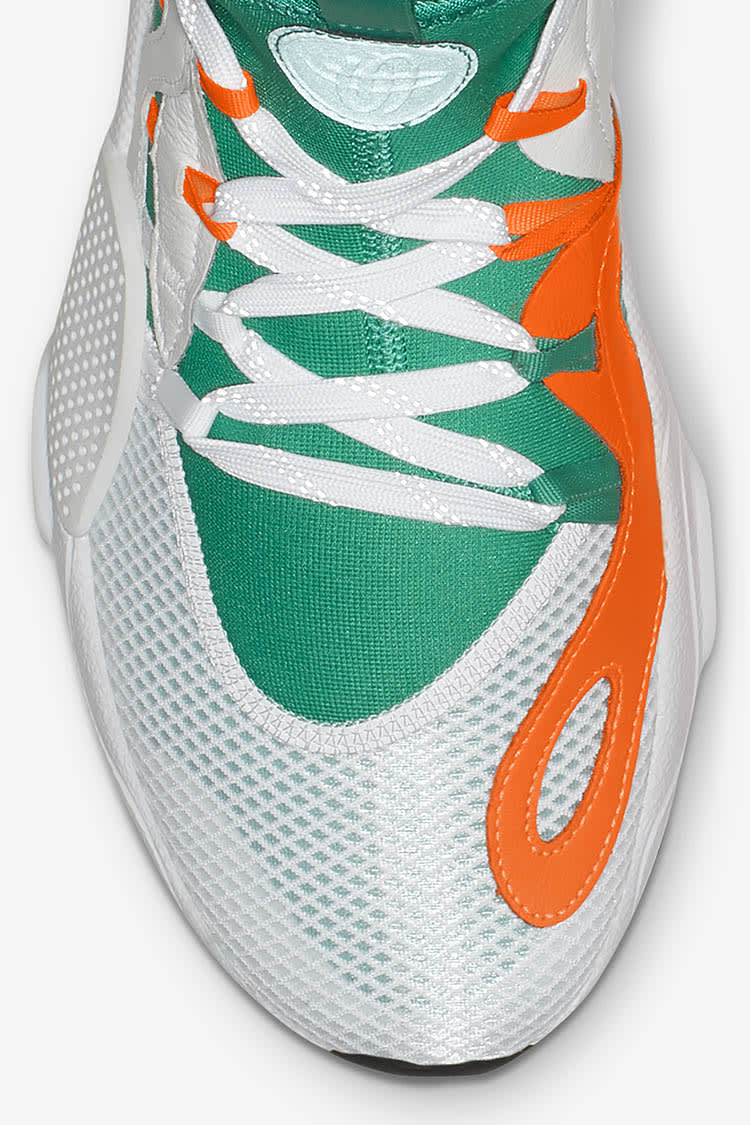 Nike huarache green and orange best sale