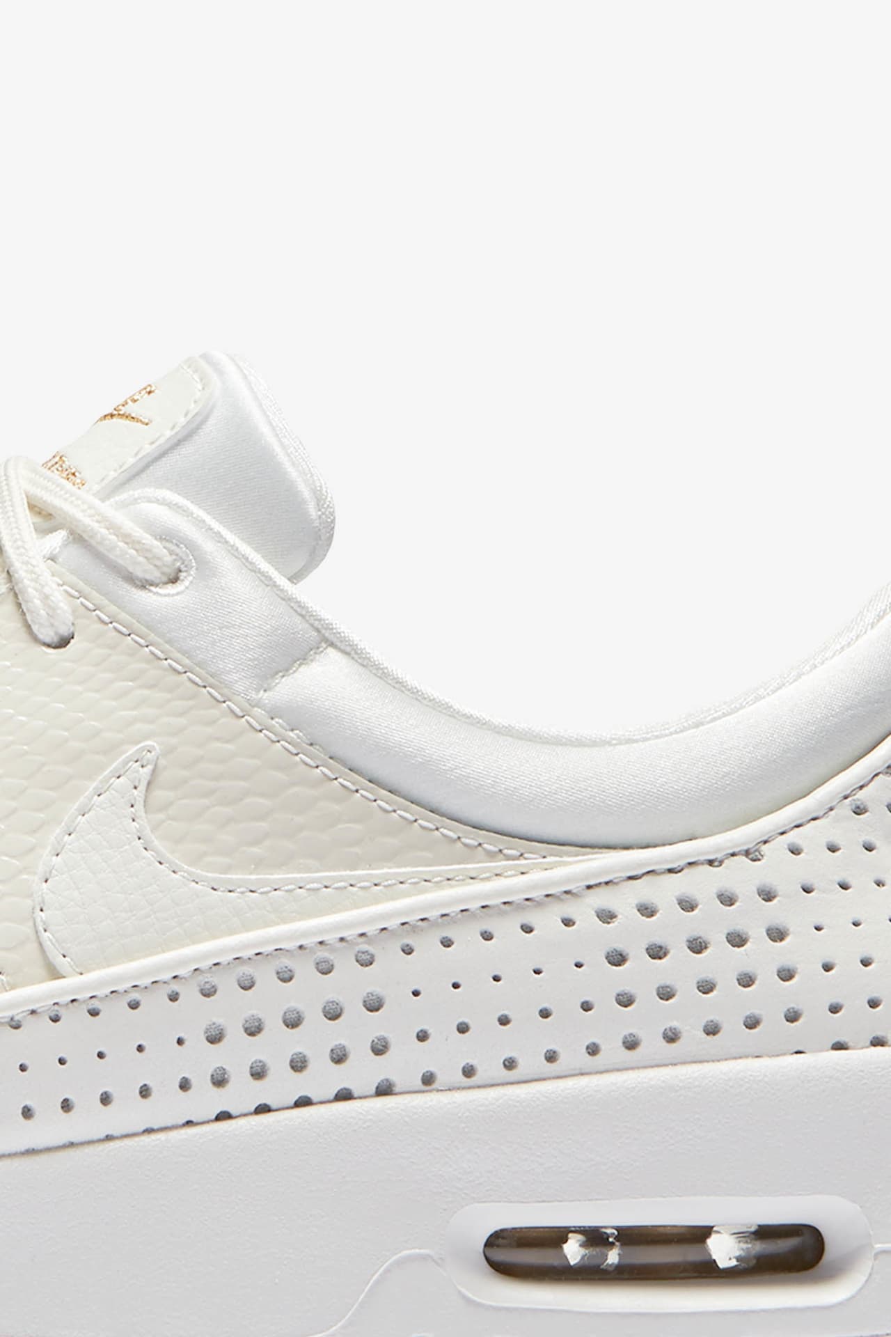 Nike thea white and gold best sale