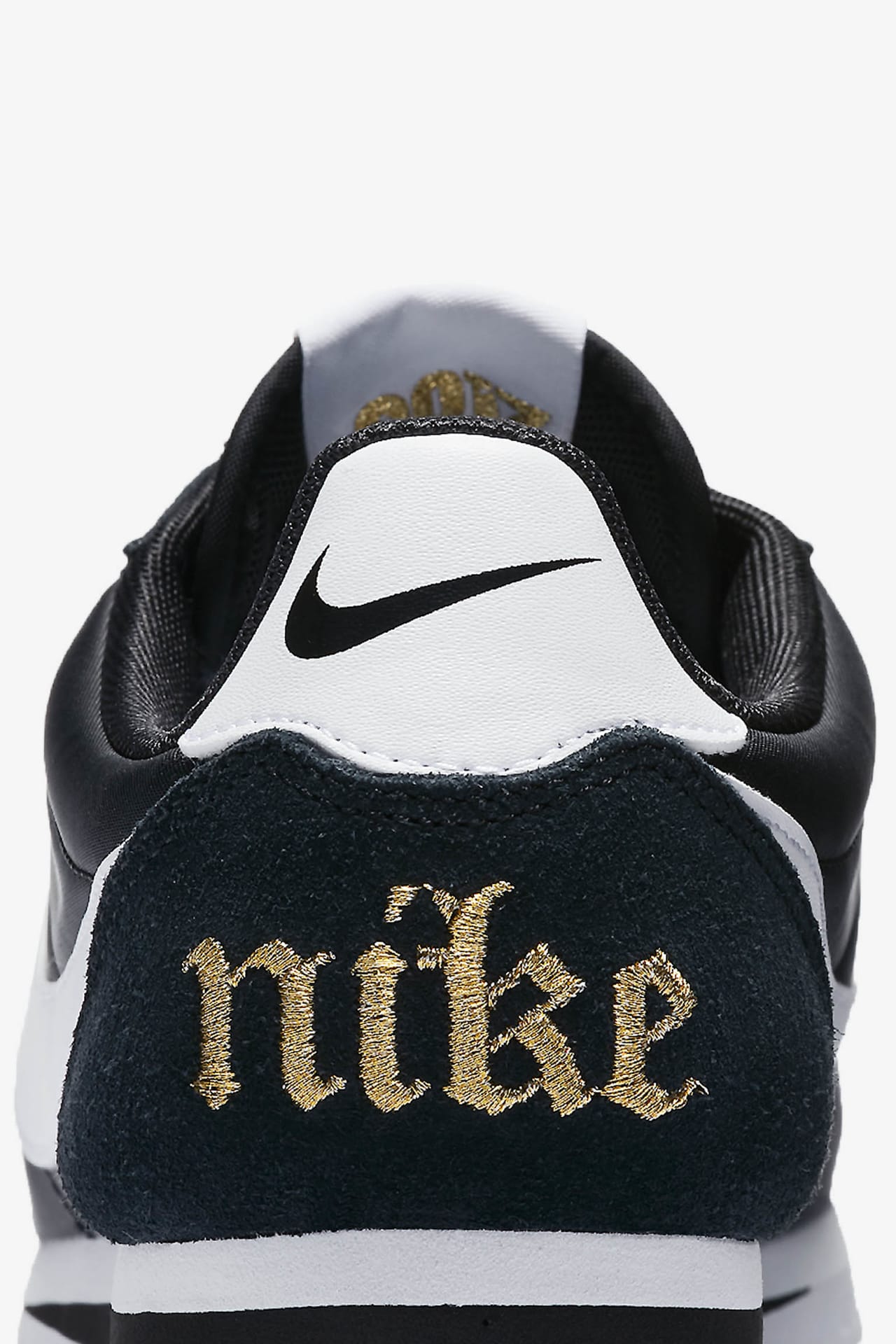 Nike classic cortez womens black and gold hotsell