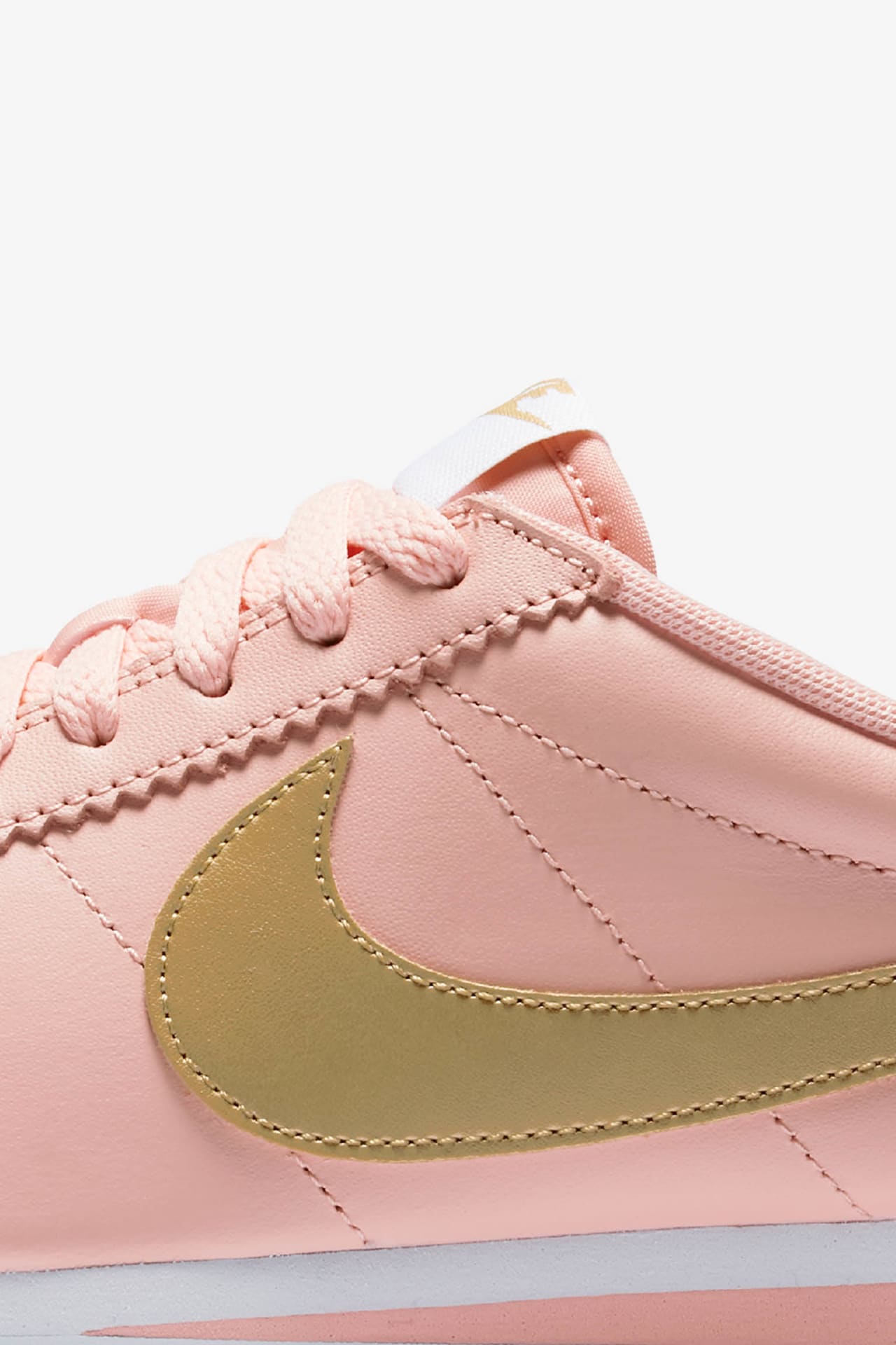 Nike pink gold shoes clearance