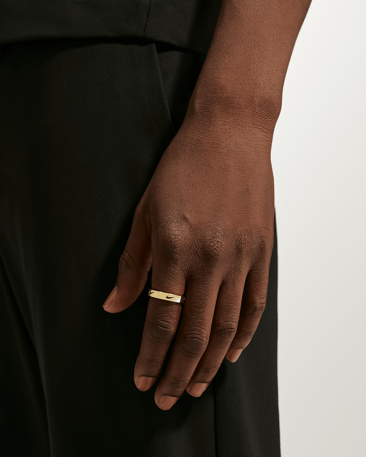 Nike Cutout Swoosh Jewelry Collection