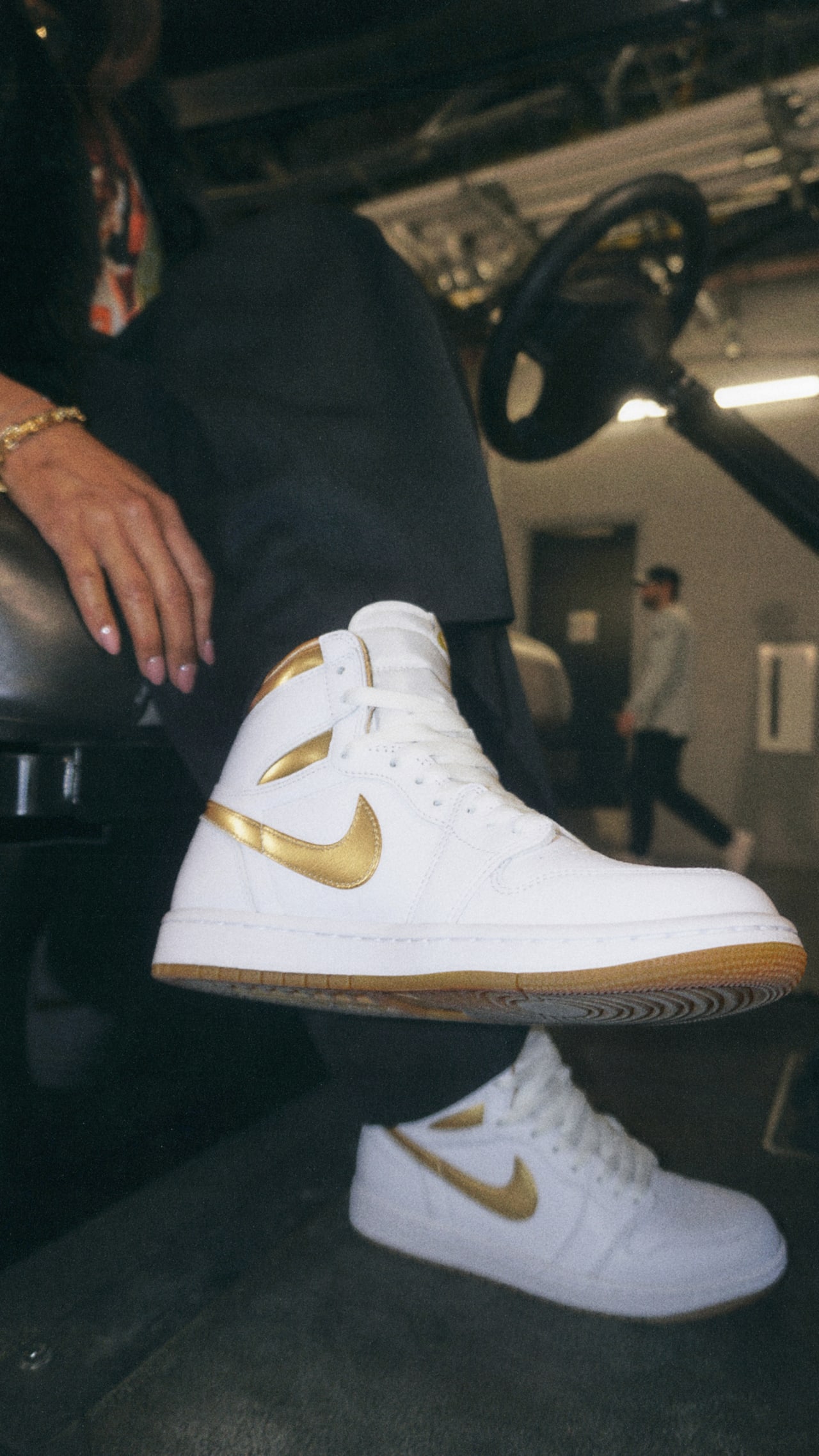 Women s Air Jordan 1 High OG White and Gold with Sandra Douglass Morgan. Nike SNKRS