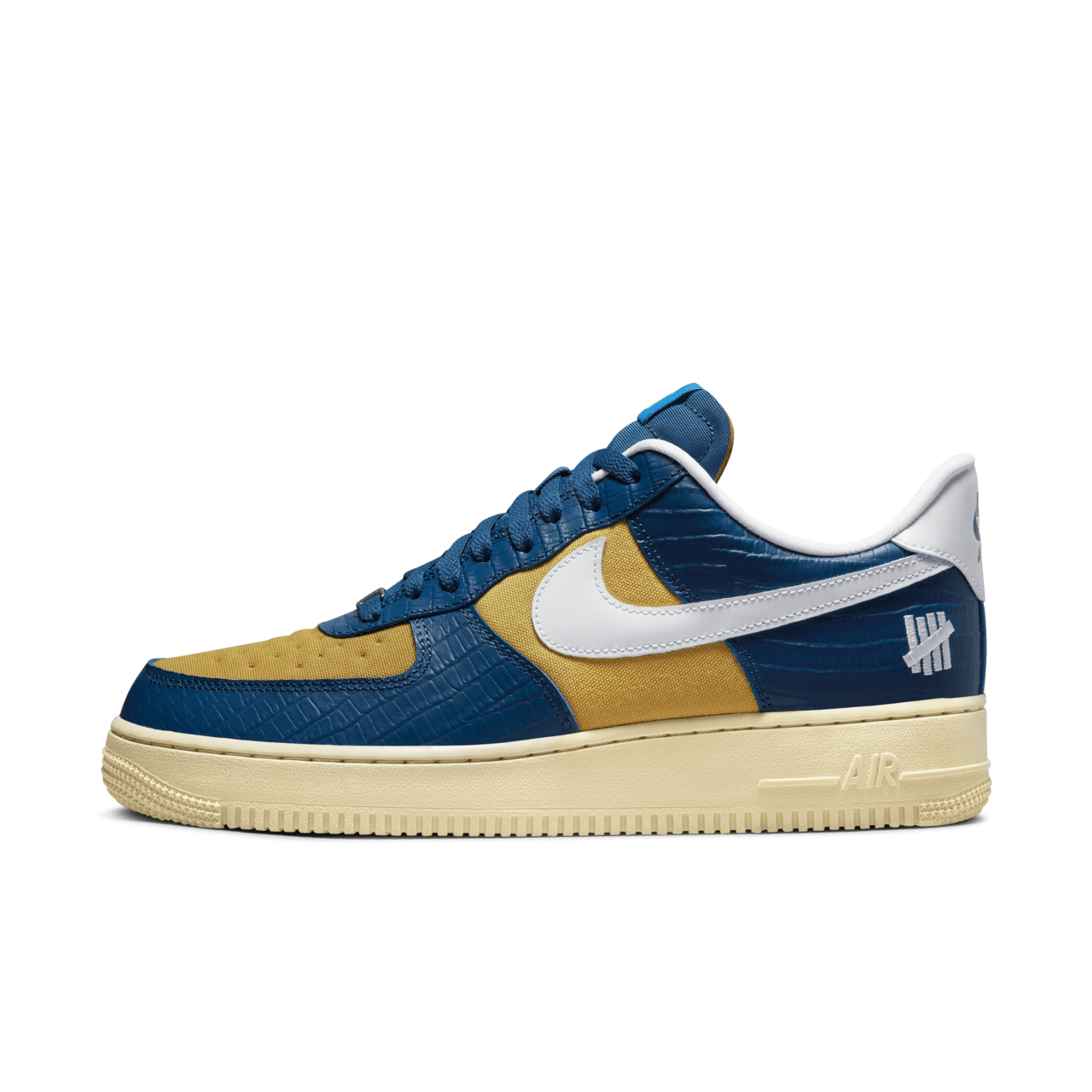 Nike undefeated gold hotsell