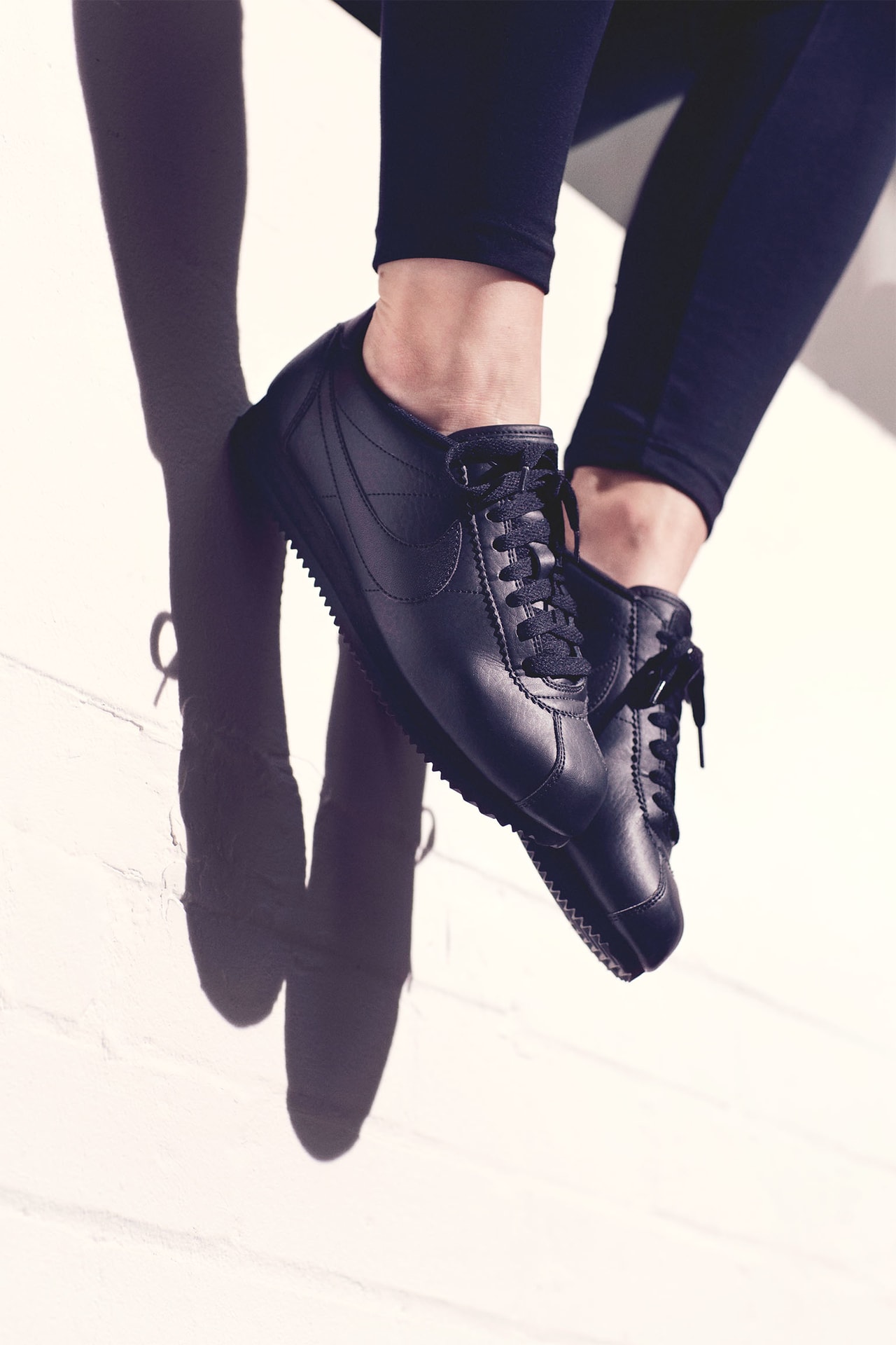 Nike cortez black womens leather best sale