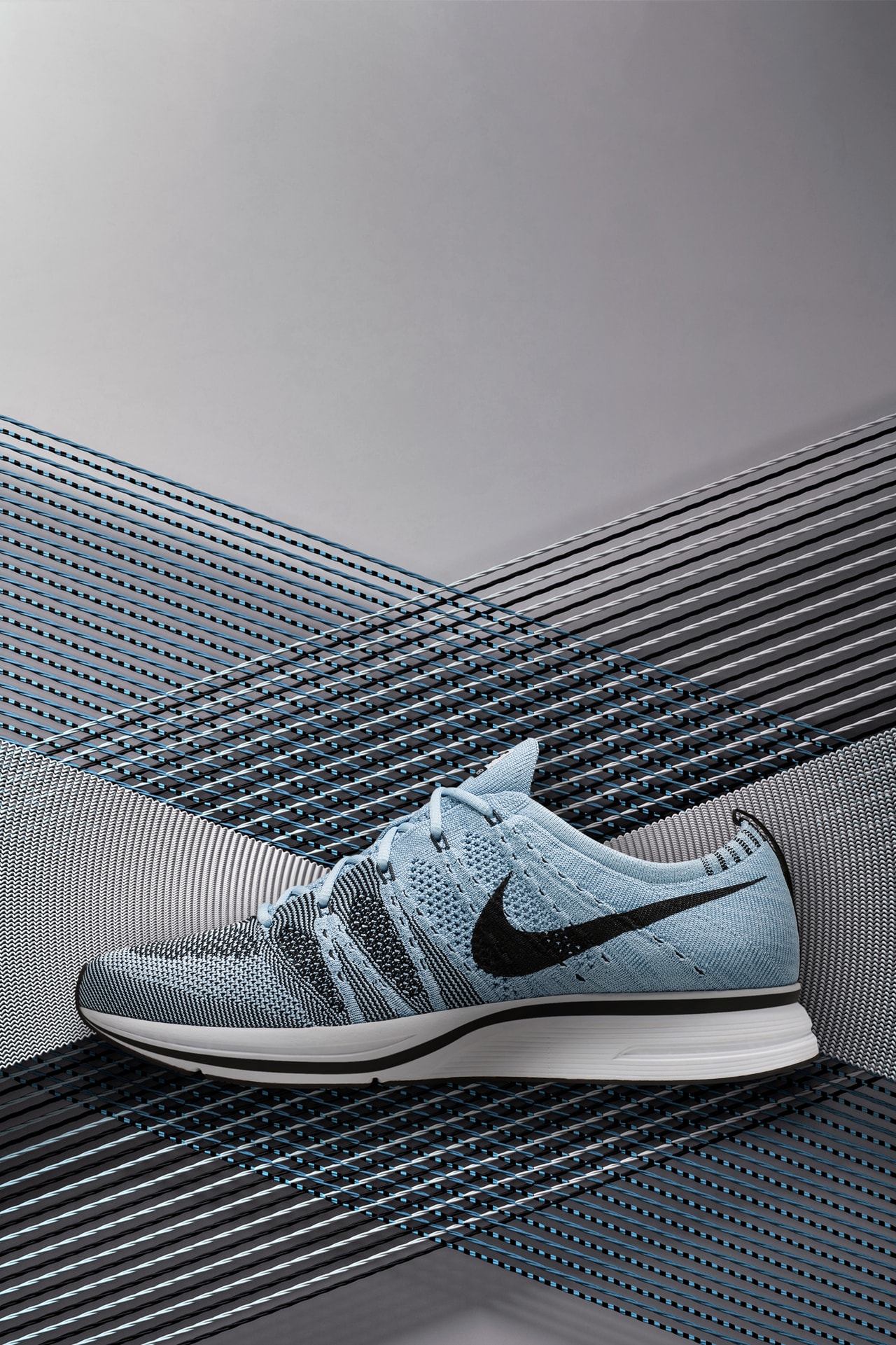 Nike flyknit trainer light blue hotsell