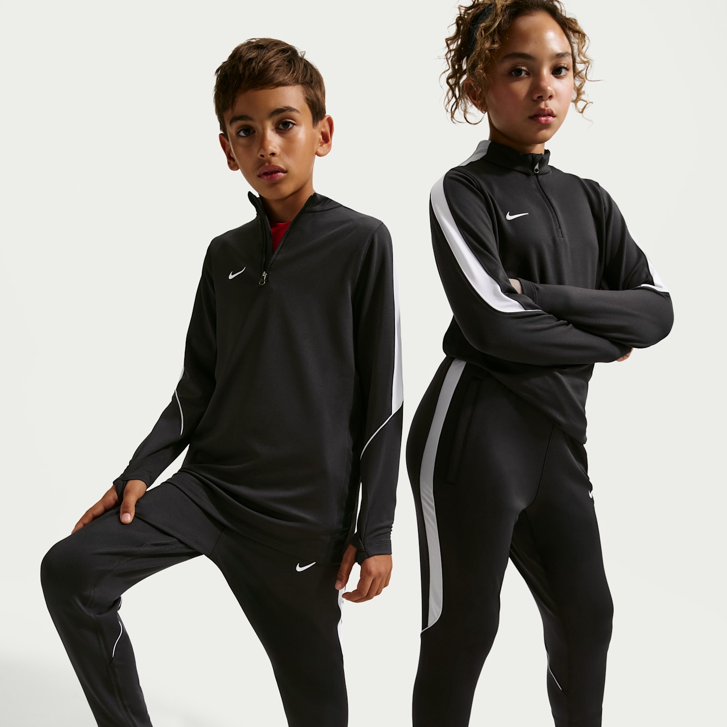 Детские футбольные брюки Nike Strike Dri-FIT, цвет: Чёрный / Белый — фото 1