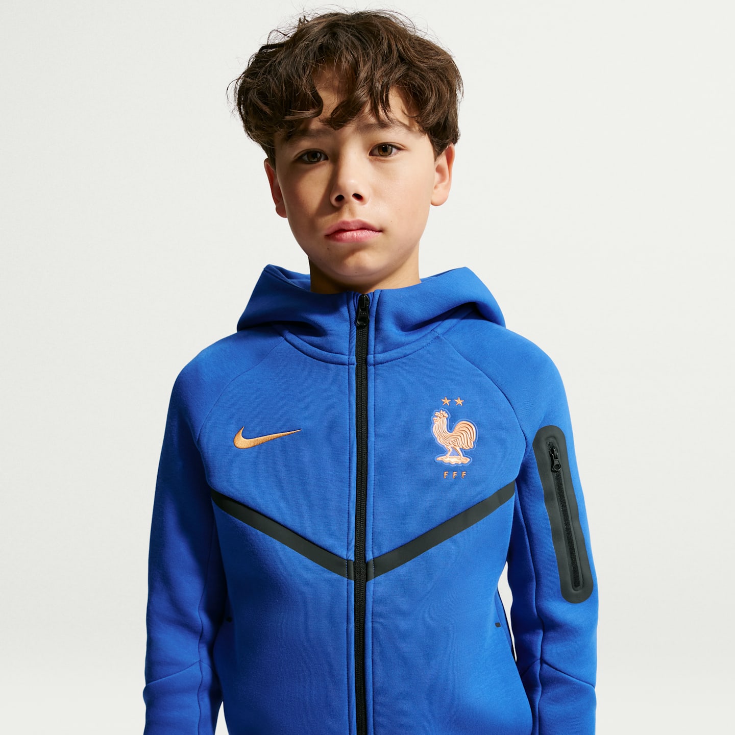 Детское футбольное худи на молнии Nike FFF Tech Fleece для мальчиков, цвет: Королевский синий / Медный — фото 1