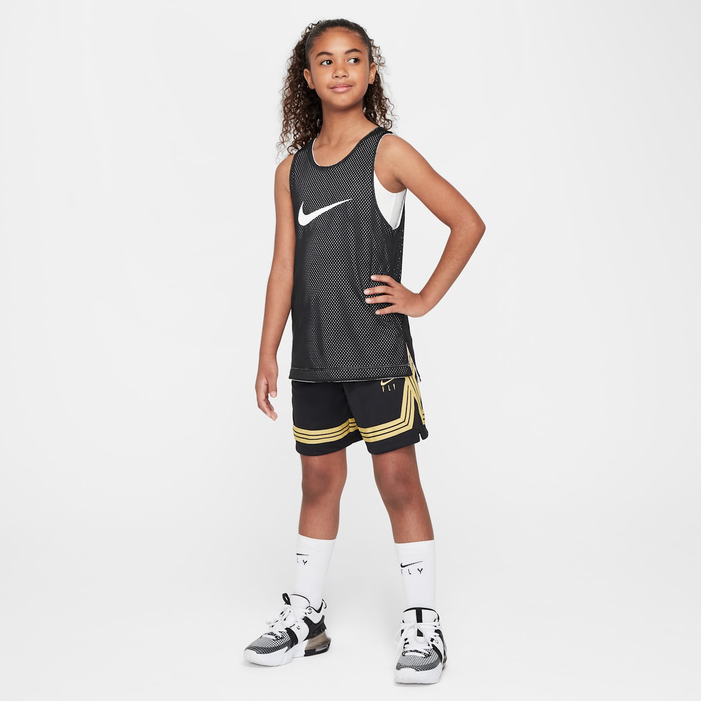 Детские баскетбольные шорты для девочек Nike Fly Crossover, цвет: Чёрный / Золотой — фото 6