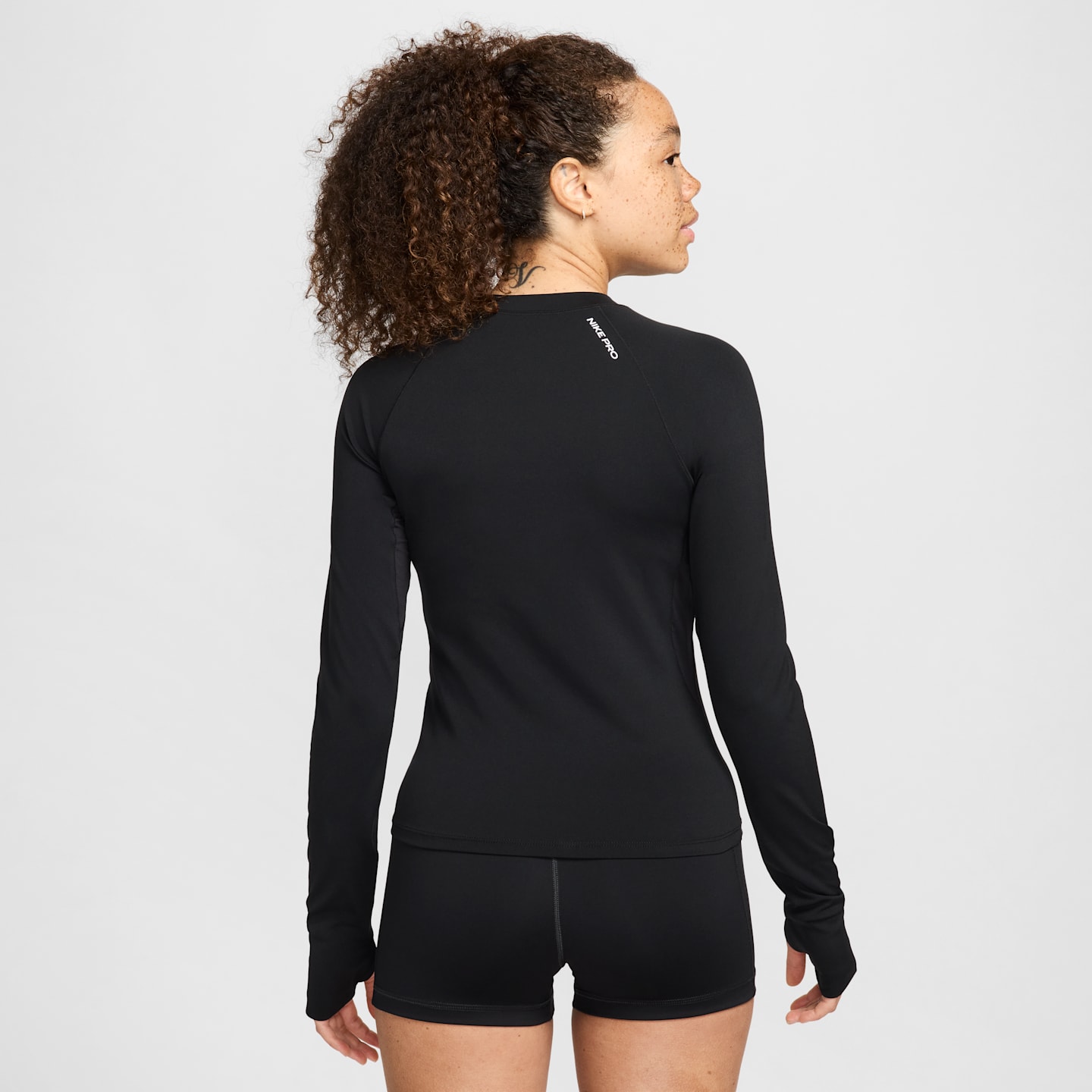 Женский топ Nike Pro Dri-FIT с длинным рукавом, цвет: Чёрный / Белый — фото 2
