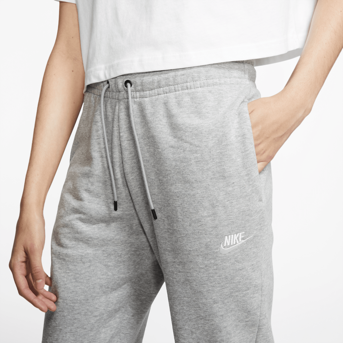 Женские флисовые брюки Nike Sportswear Essential, цвет: Серый меланжевый / Серебряный — фото 3