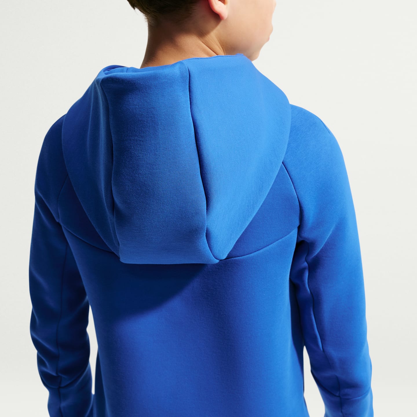 Детское футбольное худи на молнии Nike FFF Tech Fleece для мальчиков, цвет: Королевский синий / Медный — фото 2