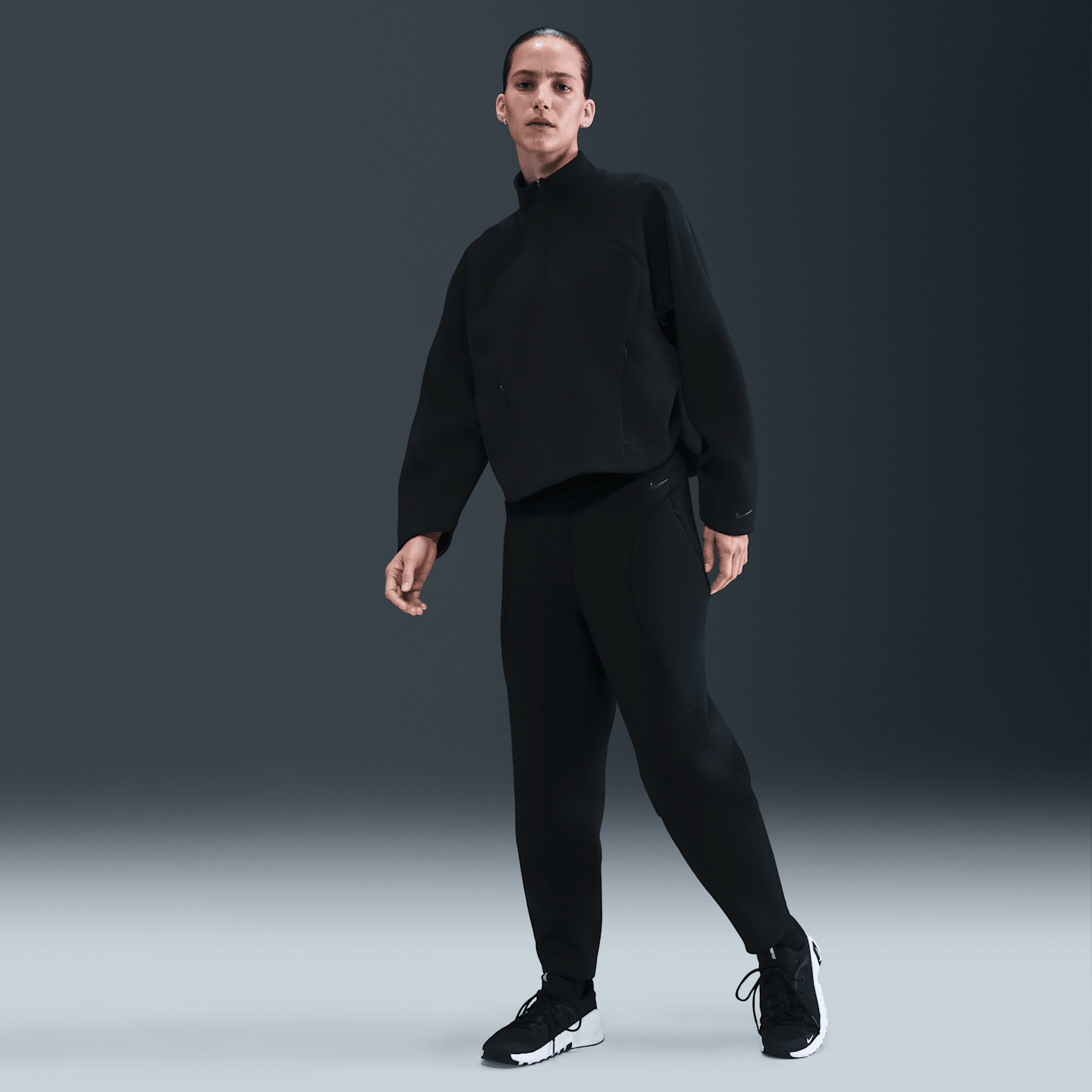 Женские брюки Nike Universa Dri-FIT свободного кроя со средней посадкой, длина 7/8, цвет: Чёрный / Серый — фото 1