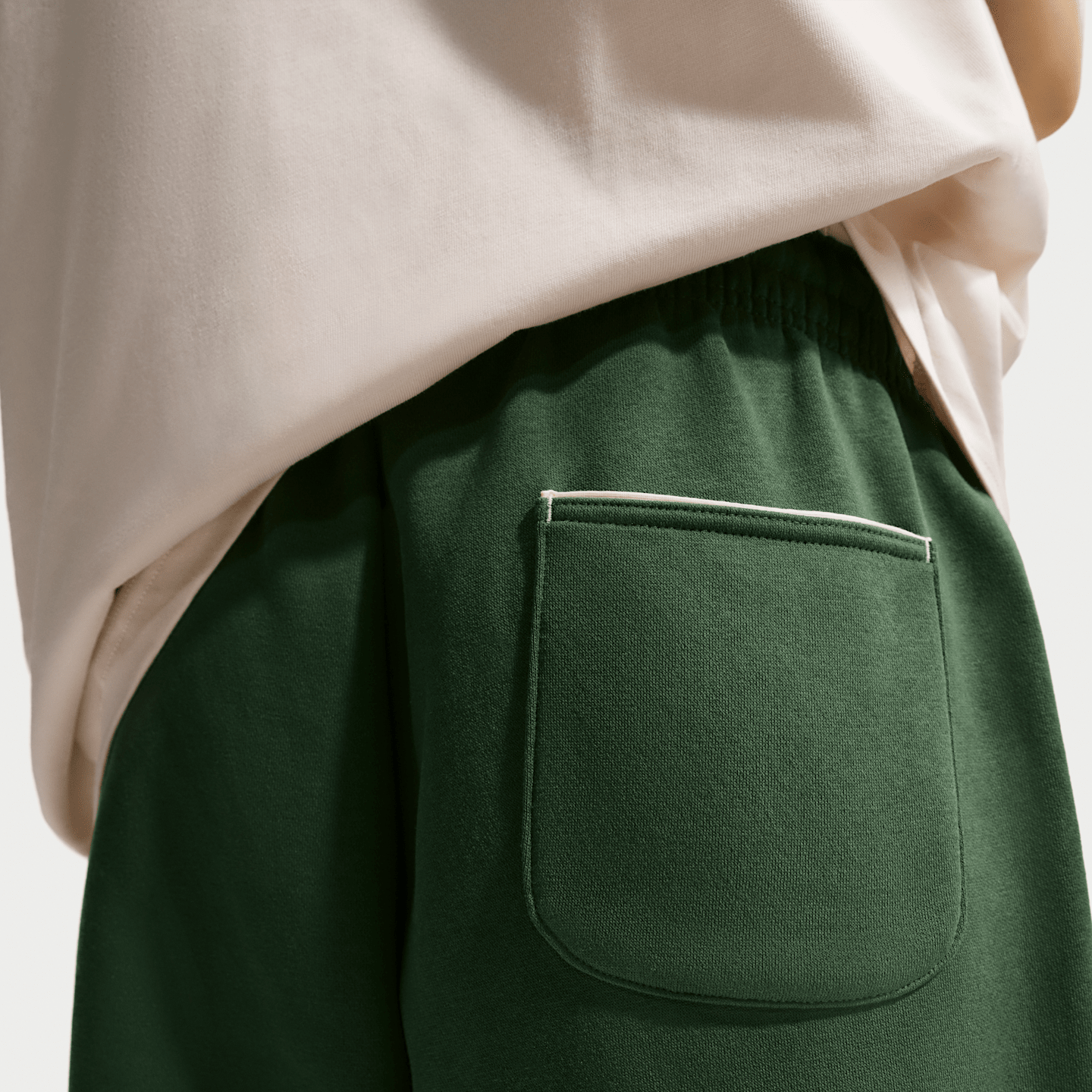 Женские брюки Nike Sportswear Phoenix Fleece Oversized High-Waisted Graphic, цвет: Алебастровый — фото 3