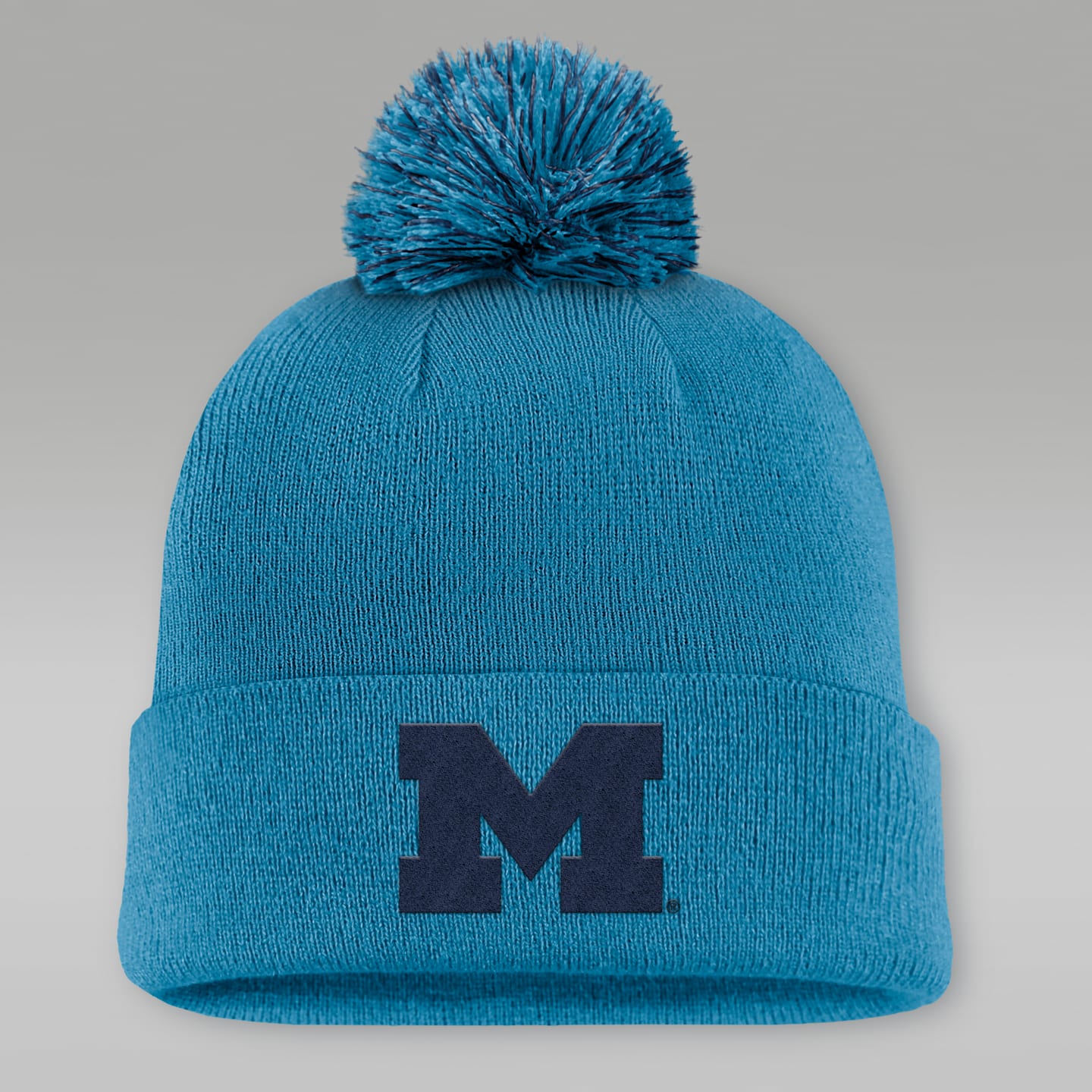 Мужская шапка Jordan Michigan Primetime Campus Toned College Cuffed Pom Beanie, цвет: Синий — фото 1