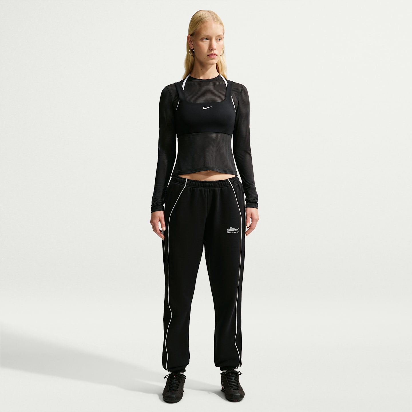 Женские брюки Nike Studio Fleece Medium Weight с манжетами, средняя посадка, цвет: Чёрный / Молочный — фото 1