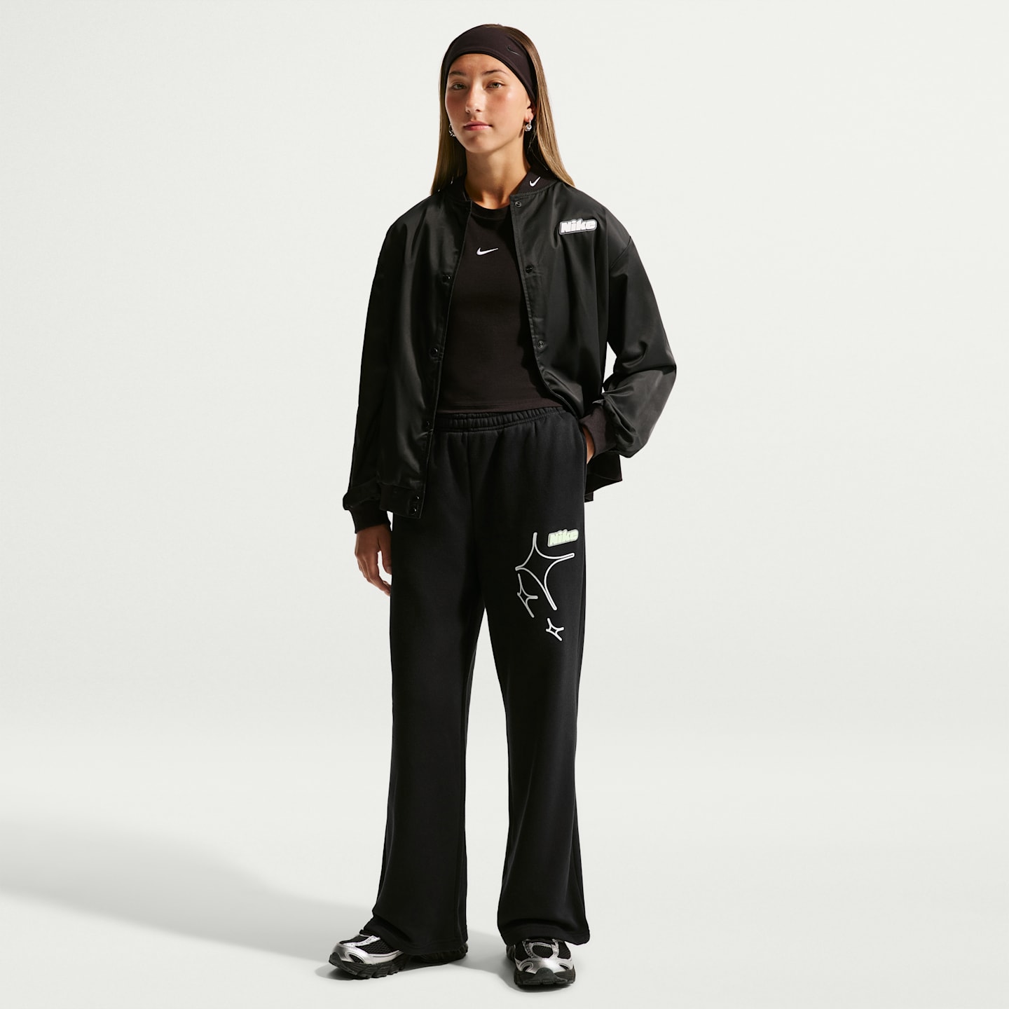 Детские брюки для девочек Nike Sportswear Studio с открытым низом, цвет: Чёрный / Белый — фото 1
