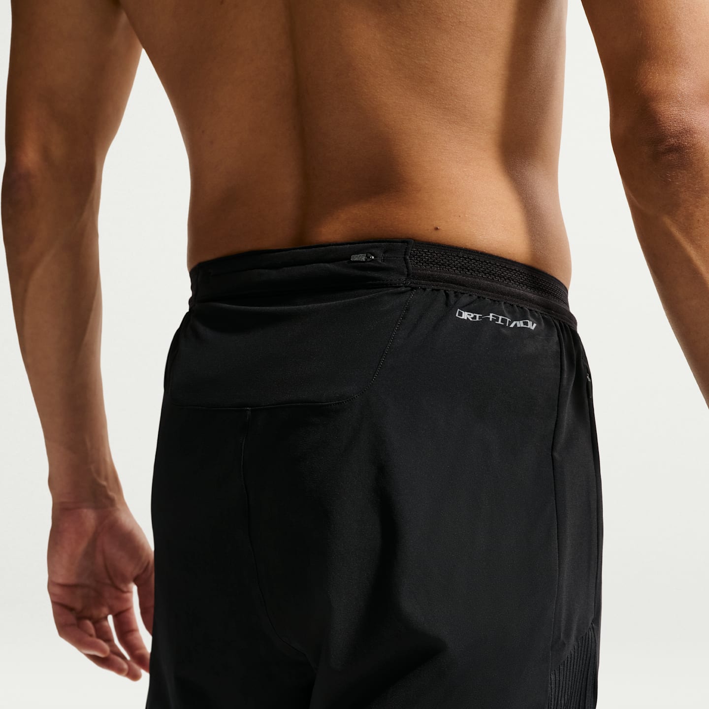 Мужские беговые брюки Nike AeroSwift Dri-FIT ADV, цвет: Чёрный / Снежный белый — фото 3
