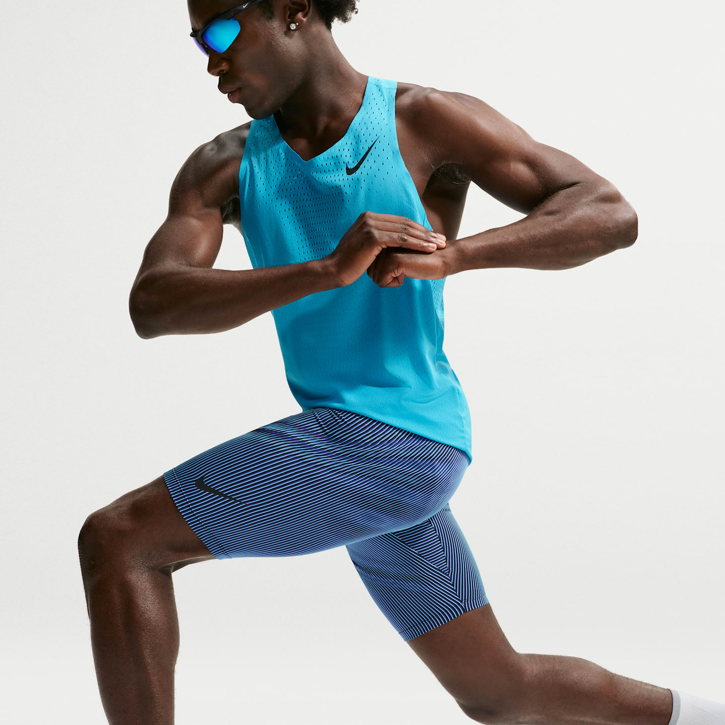 Мужские беговые тайтсы до колена Nike AeroSwift Dri-FIT ADV, цвет: Синий / Чёрный — фото 4