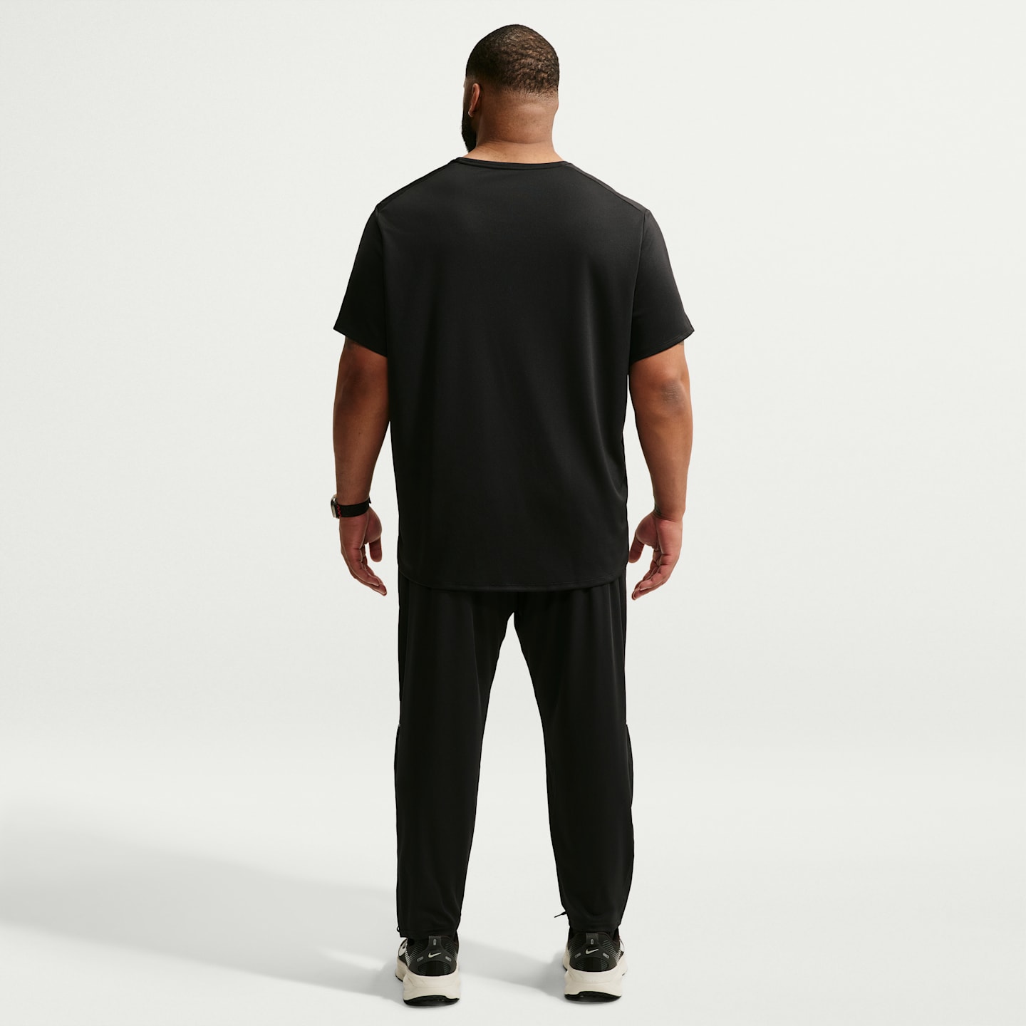 Мужские трикотажные беговые брюки Nike Miler Dri-FIT, цвет: Чёрный — фото 11