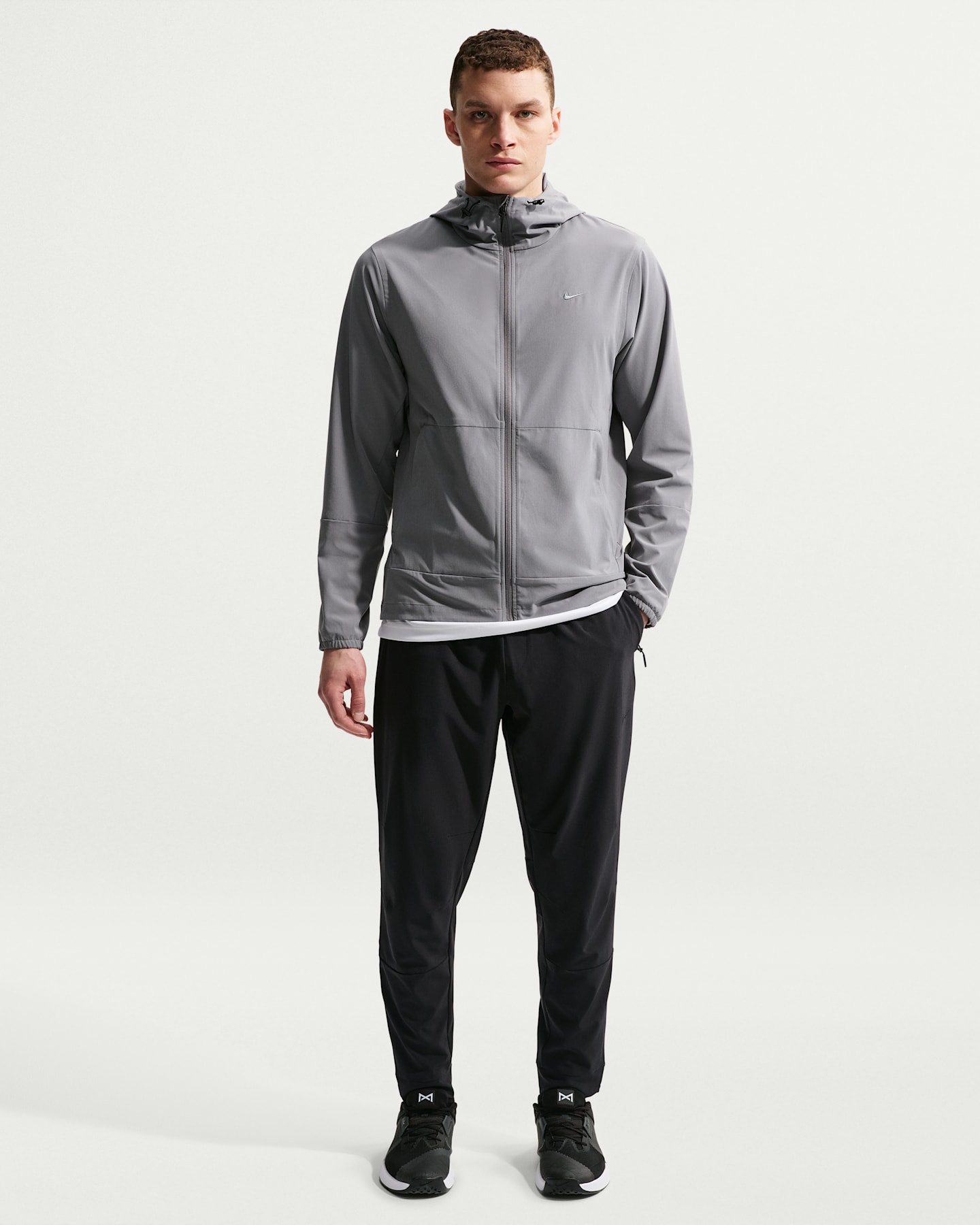 Мужские универсальные брюки Nike Unlimited Dri-FIT с молниями на манжетах, цвет: Чёрный — фото 7