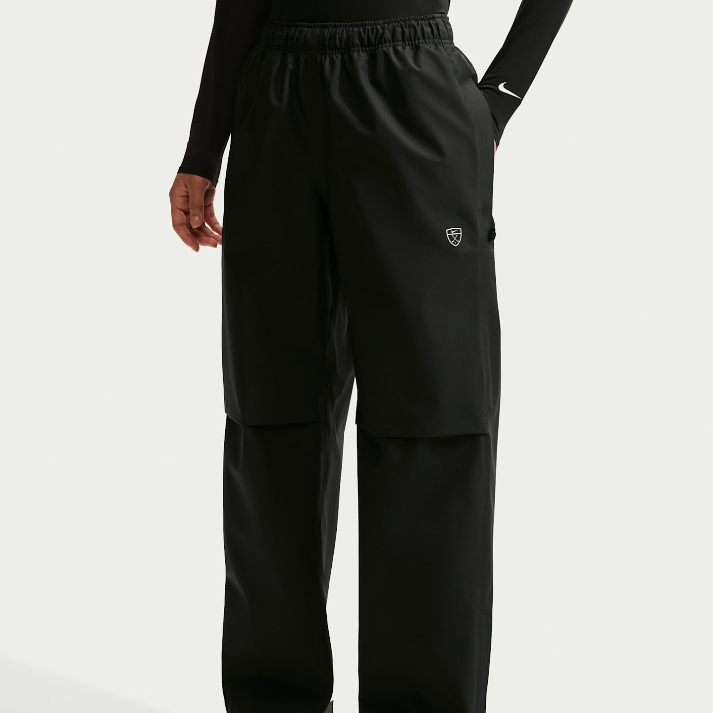 Женские брюки Nike Storm-FIT ADV Golf, цвет: Чёрный / Белый — фото 2