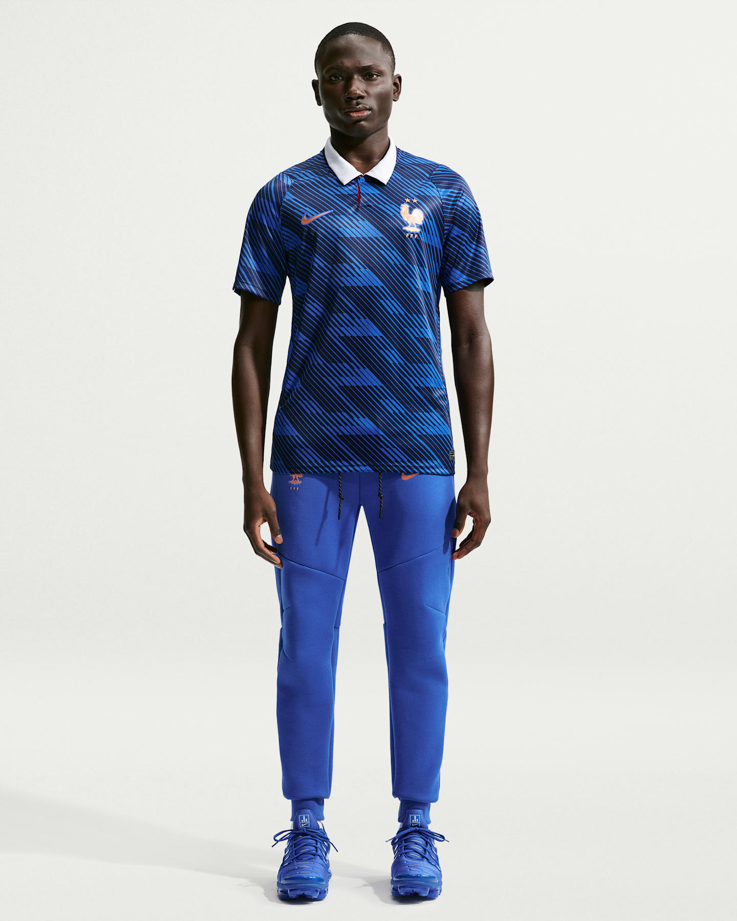 Мужские футбольные джоггеры Nike FFF Tech Fleece, цвет: Королевский синий / Медный — фото 6