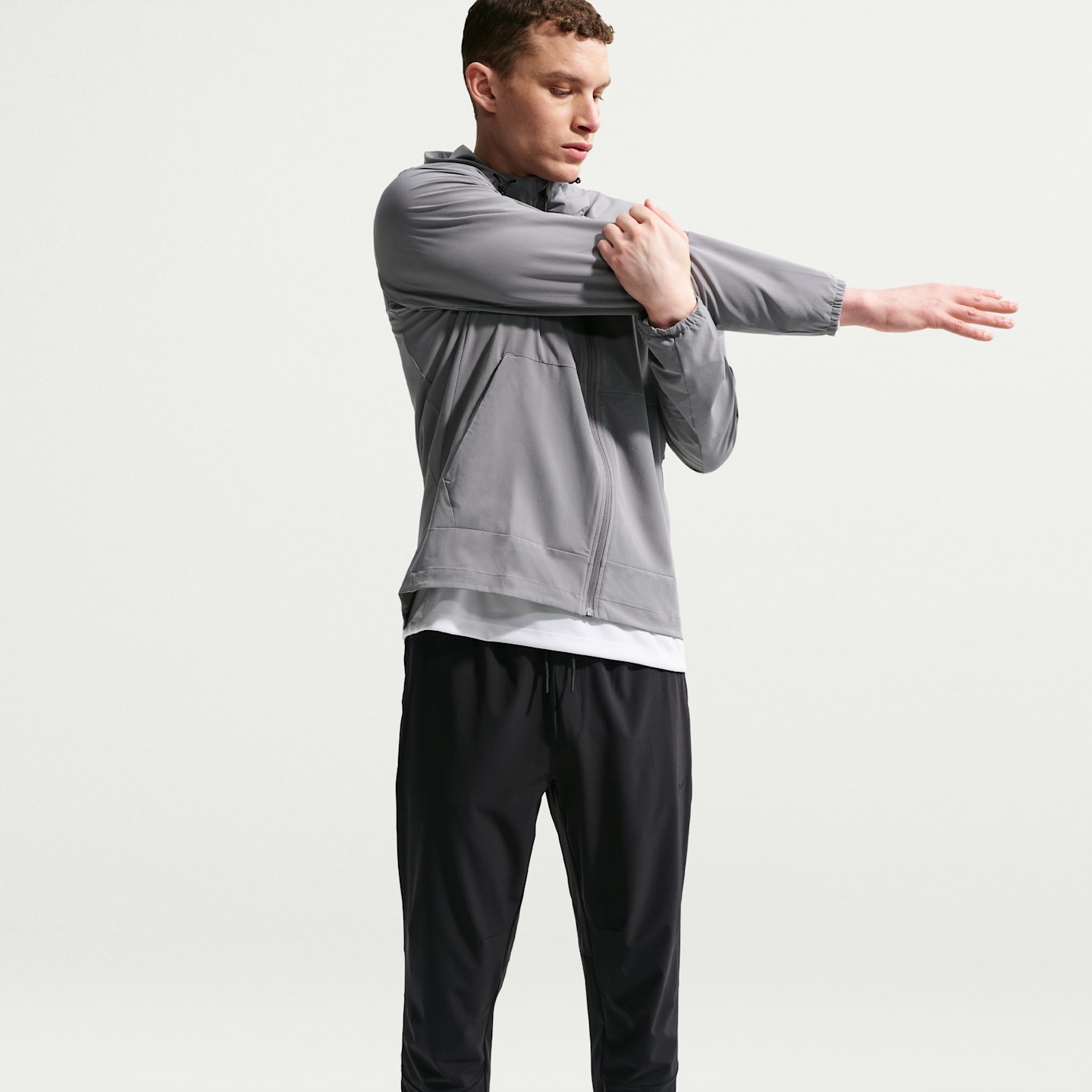 Мужские универсальные брюки Nike Unlimited Dri-FIT с молниями на манжетах, цвет: Чёрный — фото 4
