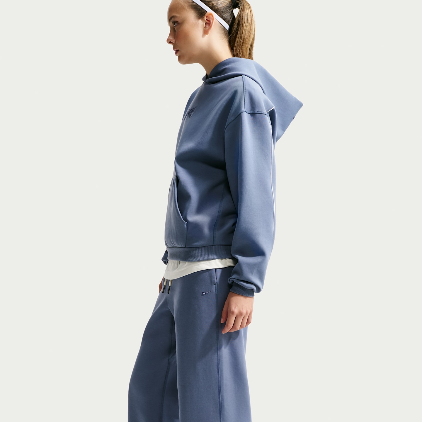 Женские баскетбольные брюки с открытым низом Nike Caitlin Standard Issue Dri-FIT, цвет: Синий — фото 4