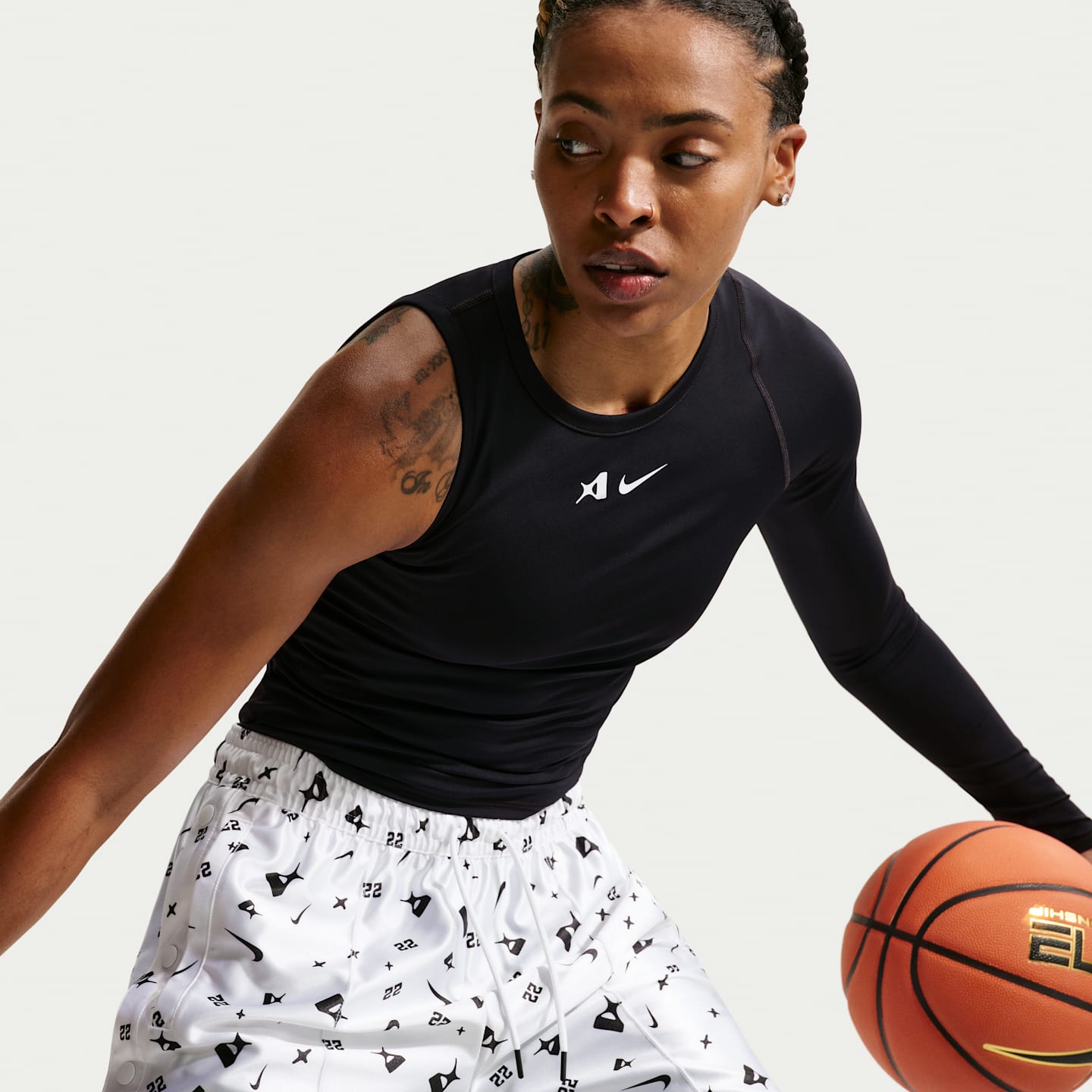 Женский топ Nike A'ja Wilson A'symmetric Reversible Dri-FIT Basketball Top, цвет: Чёрный / Белый — фото 3
