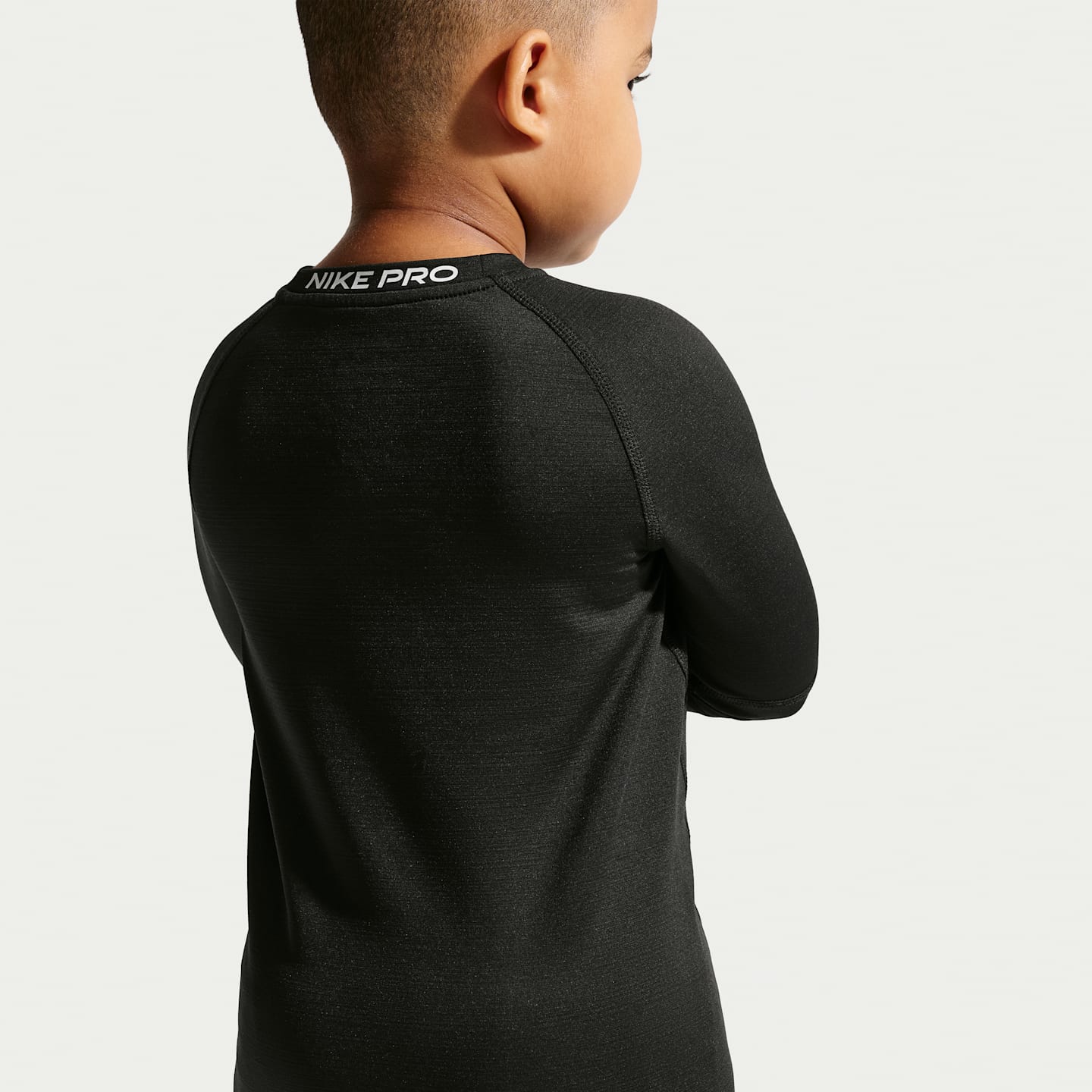 Детский топ Nike Pro Dri-FIT Warm Long-Sleeve Top, цвет: Чёрный — фото 2