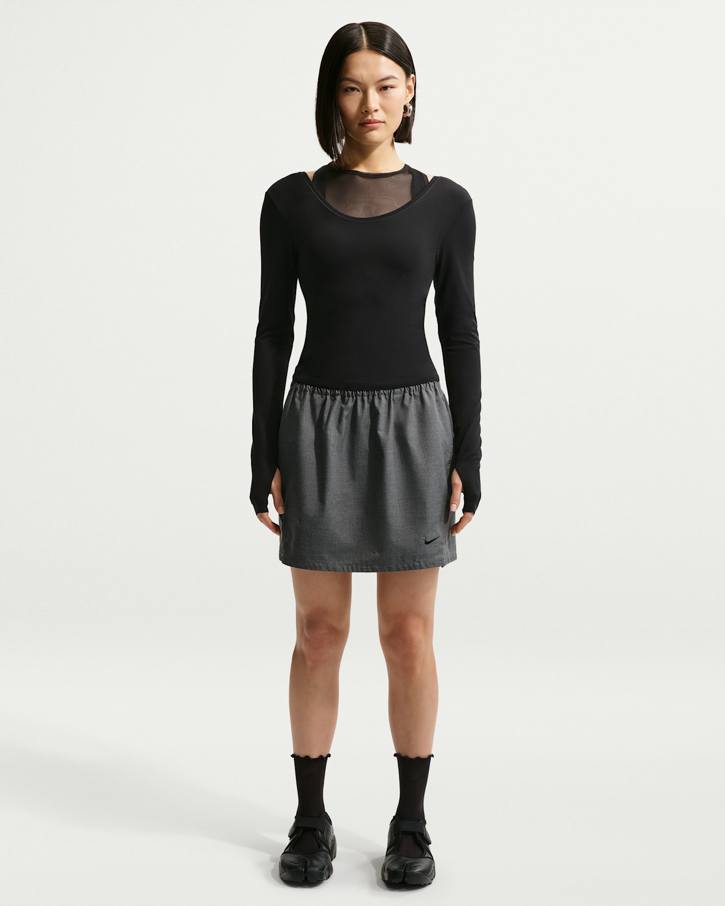 Женская юбка Nike Sportswear Loose Woven, цвет: Чёрный / Меланжевый — фото 6