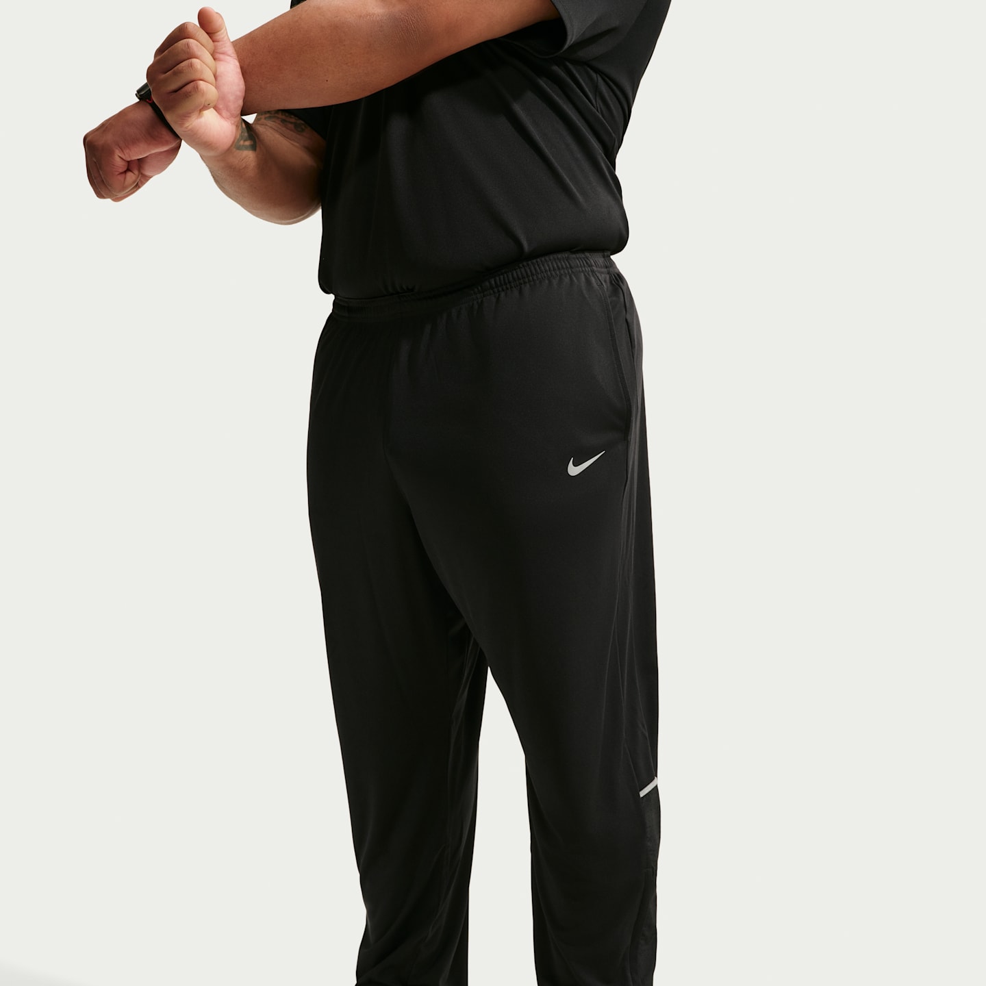 Мужские трикотажные беговые брюки Nike Miler Dri-FIT, цвет: Чёрный — фото 8