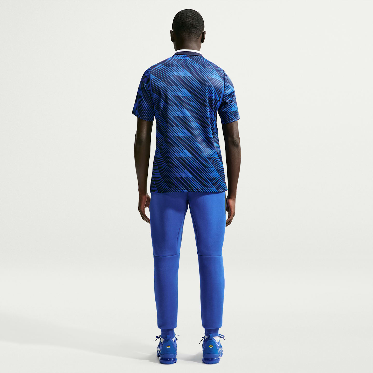 Мужские футбольные джоггеры Nike FFF Tech Fleece, цвет: Королевский синий / Медный — фото 5