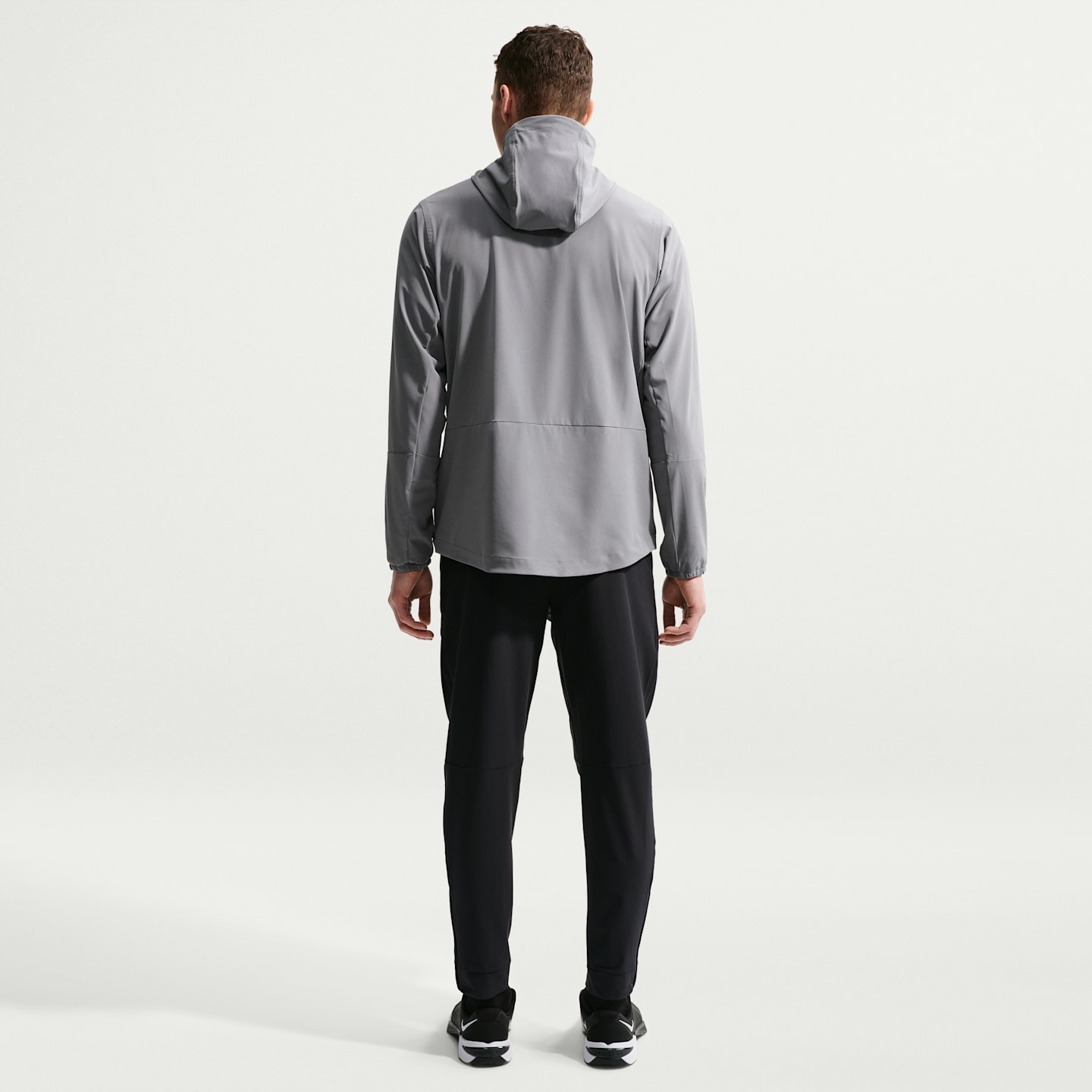 Мужские универсальные брюки Nike Unlimited Dri-FIT с молниями на манжетах, цвет: Чёрный — фото 5