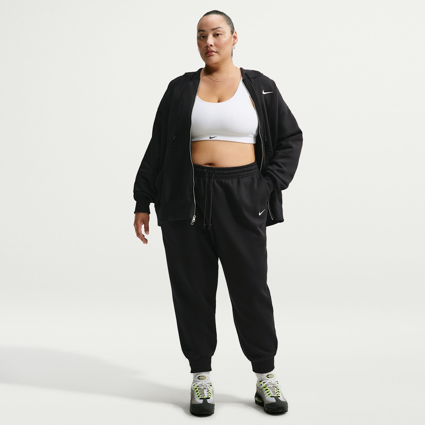 Женские брюки Nike Sportswear Phoenix Fleece Mid-Rise, цвет: Чёрный / Молочный — фото 1