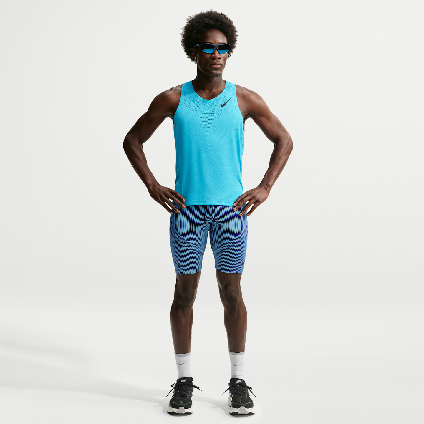 Мужские беговые тайтсы до колена Nike AeroSwift Dri-FIT ADV, цвет: Синий / Чёрный — фото 1