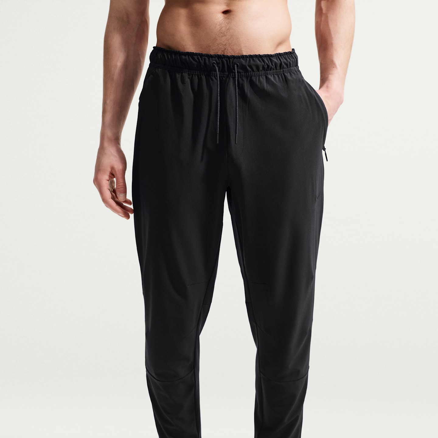 Мужские универсальные брюки Nike Unlimited Dri-FIT с молниями на манжетах, цвет: Чёрный — фото 2