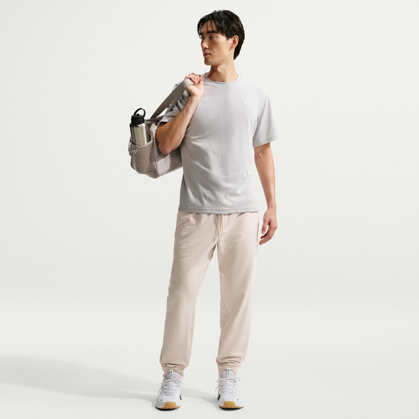 Мужские брюки Nike Primary NanoKnit Therma-FIT, цвет: Светлый коричневый — фото 1