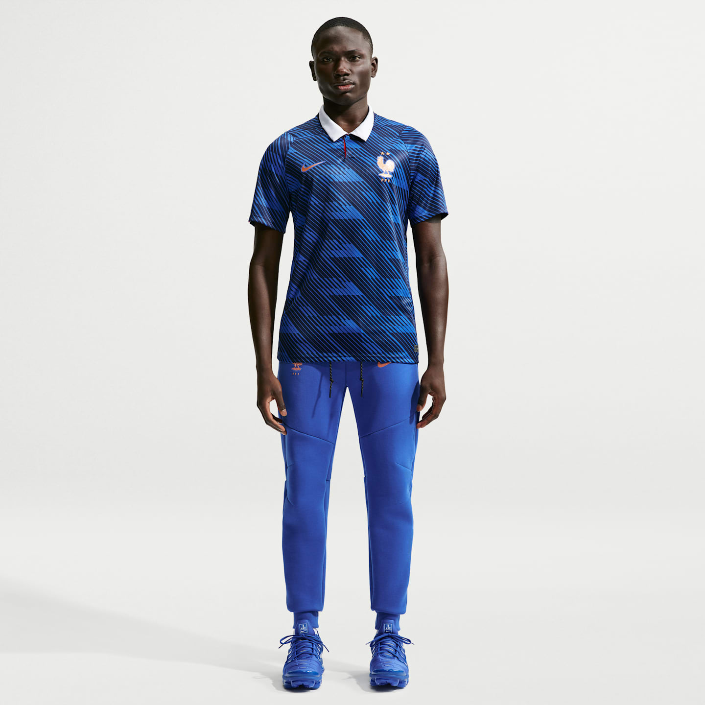 Мужские футбольные джоггеры Nike FFF Tech Fleece, цвет: Королевский синий / Медный — фото 1