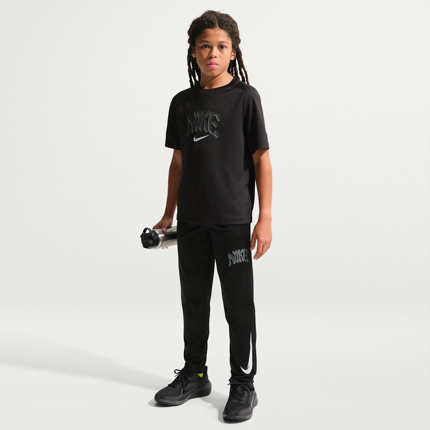 Детские флисовые брюки Nike Trophy Therma-FIT, цвет: Чёрный — фото 1