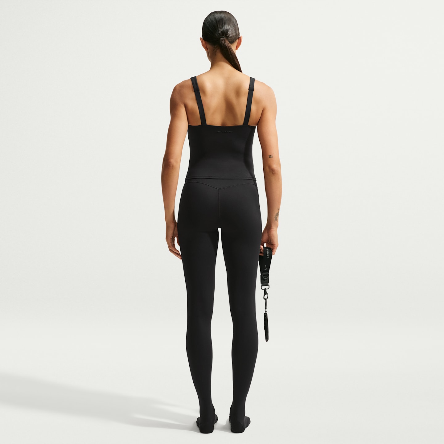Женские легинсы NikeSKIMS Matte с высокой талией и стременами, цвет: Обсидиановый — фото 5