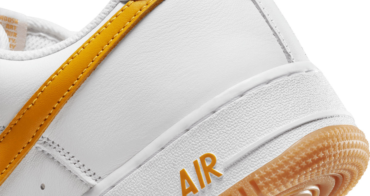 university gold nike air force 1